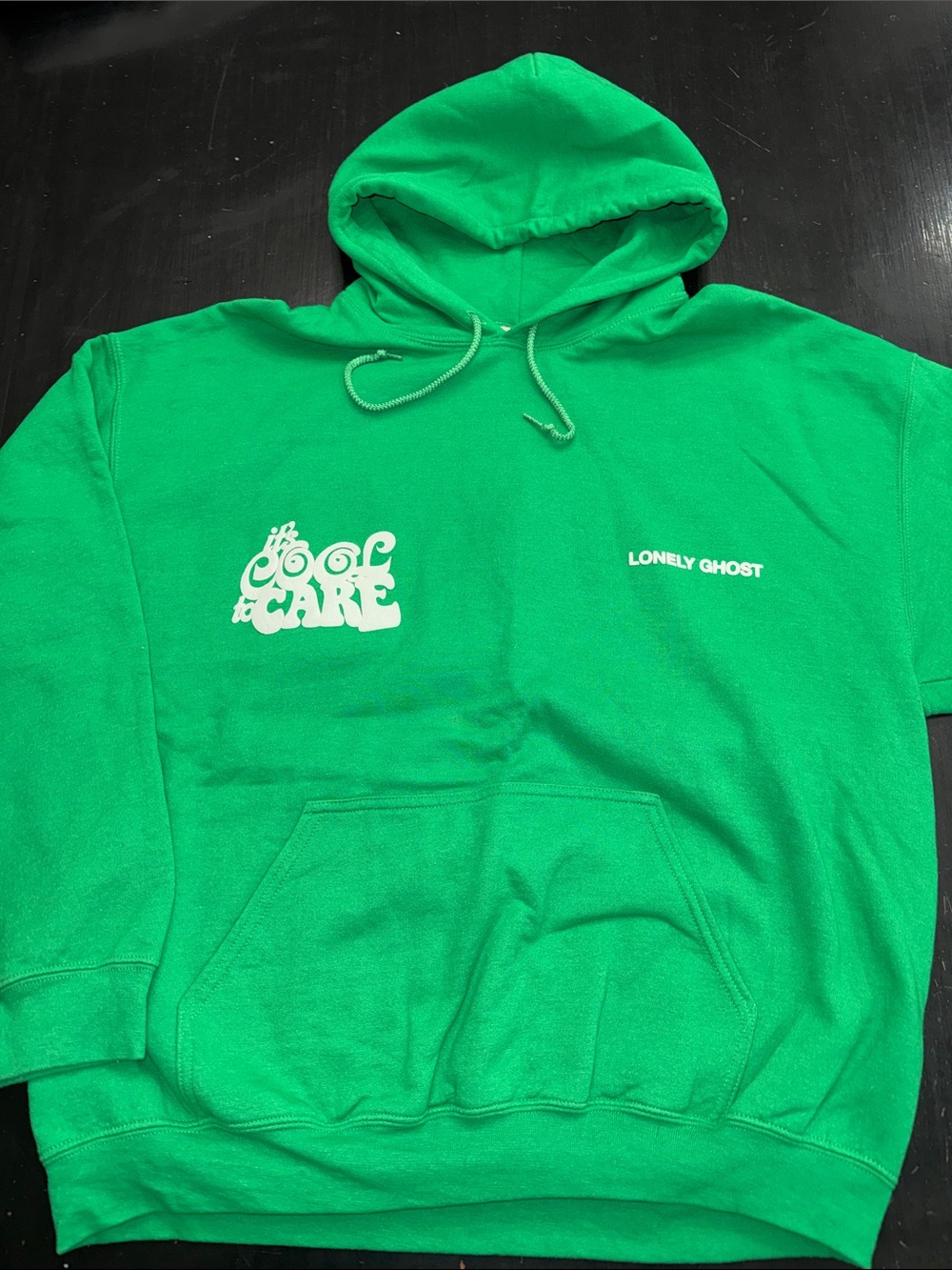 LONELY GHOST it’s cool to care green hoodie sweatshirt. size XL. great used.